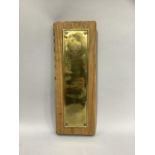 Third Reich NSDAP government building brass finger plate mounted on oak plinth.