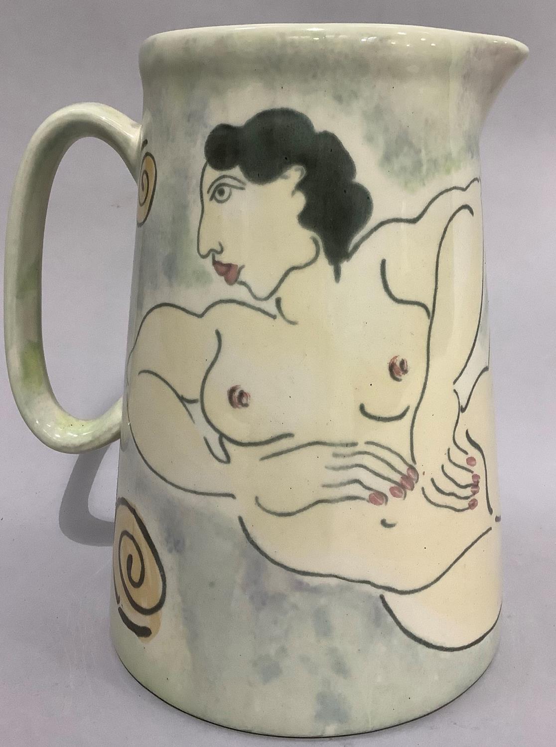 A large pottery jug by Herron Cross Pottery painted with a female nude, 22cm high