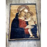 A wool rug woven with the Madonna and child in shades of deep yellow, iron red and blue, made in