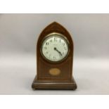 An Edward VII mahogany mantle clock inlaid with satinwood and harewood with fanned paterae and