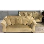 A pair of pale gold velour upholstered sofas, two seater and three seater, turned wooden legs