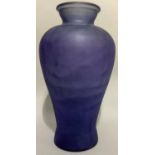 A moulded blue glass vase of baluster outline, 46cm high