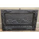 A cast iron plaque cast in relief with the Last Supper, 51cm by 82cm