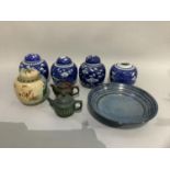 Four blue and white Chinese ginger jars and covers (one cover missing), a Japanese blue glazed bowl,