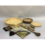 A treen bowl, breadboard, shortbread mould, basket and other items