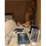 Religious icons including crucifix, rosary beads, olive wood carving of the Virgin Mother and child
