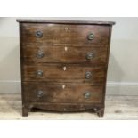 An early 19th century mahogany commode adapted having a lift up top and four dummy drawer front with