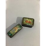 Two hand painted Russian lacquered boxes, one with flowers on an olive green ground to the lid,
