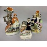 Three 19th century Staffordshire figure groups including Red Riding Hood and the Wolf with tree