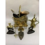 Brass copper coal helmet, poker, toasting fork, three light candelabra, chamber stick, Turkish
