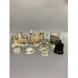A collection of 19th century Staffordshire castles and cottage pastille burners, various sizes