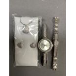 A lady's Sekonda quartz wristwatch, earrings and pendant suite all set with colourless pastes and in