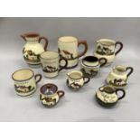 A quantity of Torquay ware, earthenware with white slip painted in green, brown and blue, incised