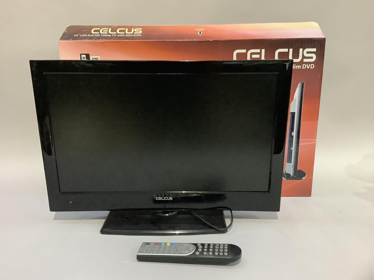 A Celcus 22" flat screen LED television with remote control and original box together with a Dell