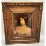 A crystoleum after A. Asti, a head and shoulders portrait of a young female with long brunette
