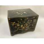 A 19th century ebonised and gilt liqueur box painted and inlaid in mother of pearl with birds and