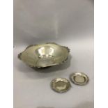 A .800 silver fruit bowl on three legs together with two small coasters approximate weight 110z