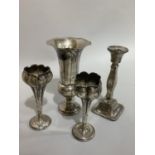 An Edward VII silver flower vase, tapered ballotter form with wavy rim and circular outline with