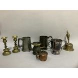 Pewter mugs and measures, two handled silver plated loving cup, miniature copper kettle, Tibetan