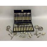 A set of twelve EPNS and ivorine handled fish knives and forks with silver ferrules in fitted case