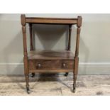 A 19th century rosewood whatnot with drawer and on slender ring turned legs with brass caps and