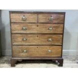 A early 19th century mahogany cross banded chest with boxwood stringing, having two short and