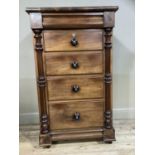 A Victorian mahogany chest having a frieze drawer above four graduated drawers with turned handles