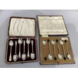 A case of six George V silver coffee spoons, Sheffield 1911 and a case of six silver bean handled