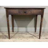 A mahogany side table with drawer to the frieze, on slender turned legs