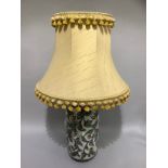 A Portuguese pottery armorial table lamp with shade