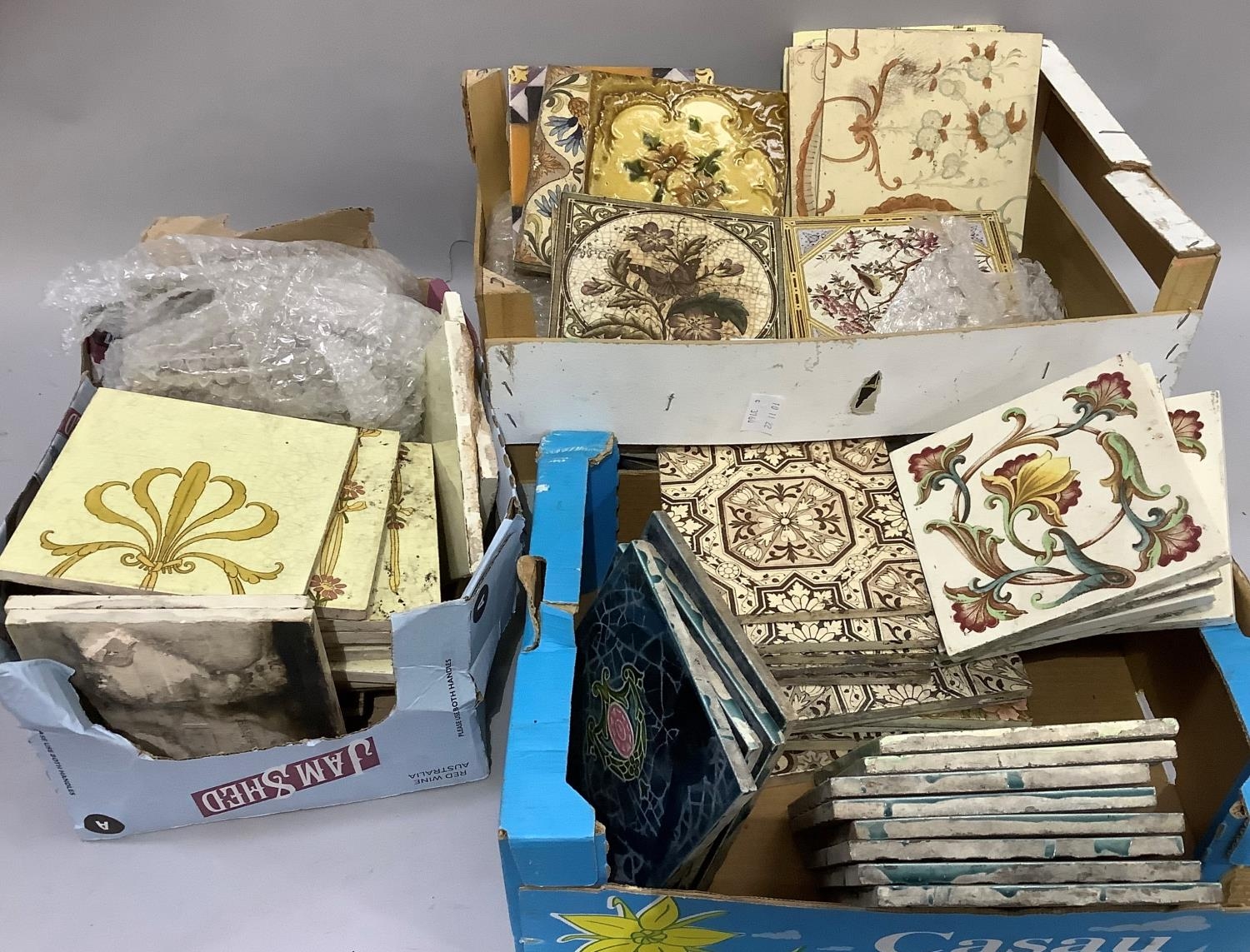 A quantity of Victorian and Edwardian ceramic tiles, various patterns and makes