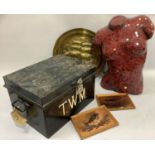 A tin deed box initialled TWM, a pressed brass coloured wall plaque, two copper pictures and a red