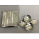 A George V silver clover sweetmeat dish, Sheffield 1911 and a silver cigarette case, Chester 1924,