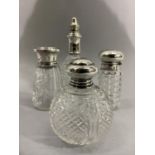 Four George V cut glass silver mounted perfume bottles, Birmingham 1912, 1919, 1921 and 1922