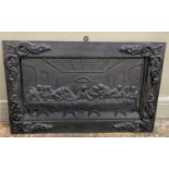 A cast iron plaque cast in relief with the Last Supper, 51cm by 82cm