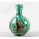 A DELLA ROBIA EARTHENWARE VASE BY HARRY PEARCE, of a globular form with drawn neck, the brown and