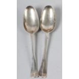 A PAIR OF GEORGE I SILVER RAT TAILED SERVING SPOONS, Andrew Archer, London 1721, initialled WEM,