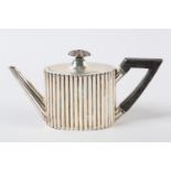 A GEORGE III BATCHELOR'S SILVER TEAPOT, Henry Chawner, London 1786, of oval reeded form, disc lid