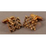 A PAIR OF CUFFLINKS IN 18CT GOLD c.1973 each with a pierced lattice face of rectangular outline,