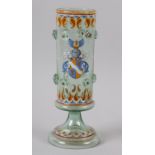 A GERMAN ARMORIAL GOBLKET BY FRITZ HECKERT, the cylindrical body of green glass and enamelled with a