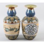 A PAIR OF DOULTON LAMBETH STONEWARE VASES BY FLORENCE BARLOW, with broad flat rim, the ovoid body