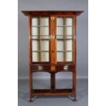 A LIBERTY'S MAHOGANY SATINWOOD, MOTHER-OF-PEARL AND ABALONE INLAID DISPLAY CABINET, having a