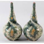 A PAIR OF DOULTON LAMBETH STONEWARE VASES designed by George Tinworth rounded with tapered and