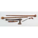 TWO AFRICAN KNOBKERRIES, one in hardwood with compressed circular head, the tapered shaft with