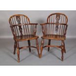 A PAIR OF EARLY 19TH CENTURY YEW-WOOD AND ELM LOW BACK WINDSOR ARMCHAIRS, pierced splat and rail