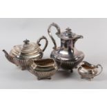 A FOUR PIECE SILVER TEA SERVICE, James Dixon & Sons Ltd, Sheffield 1899, 1900 and 1911, of oblong