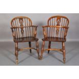 A PAIR OF EARLY 19TH CENTURY ELM AND ASH WINDSOR LOW BACK ARMCHAIRS, pierced splat and rail back,
