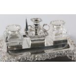 A GEORGE IV SILVER INK STAND, maker's initials IS over TS, Sheffield 1825, rectangular, the rim cast