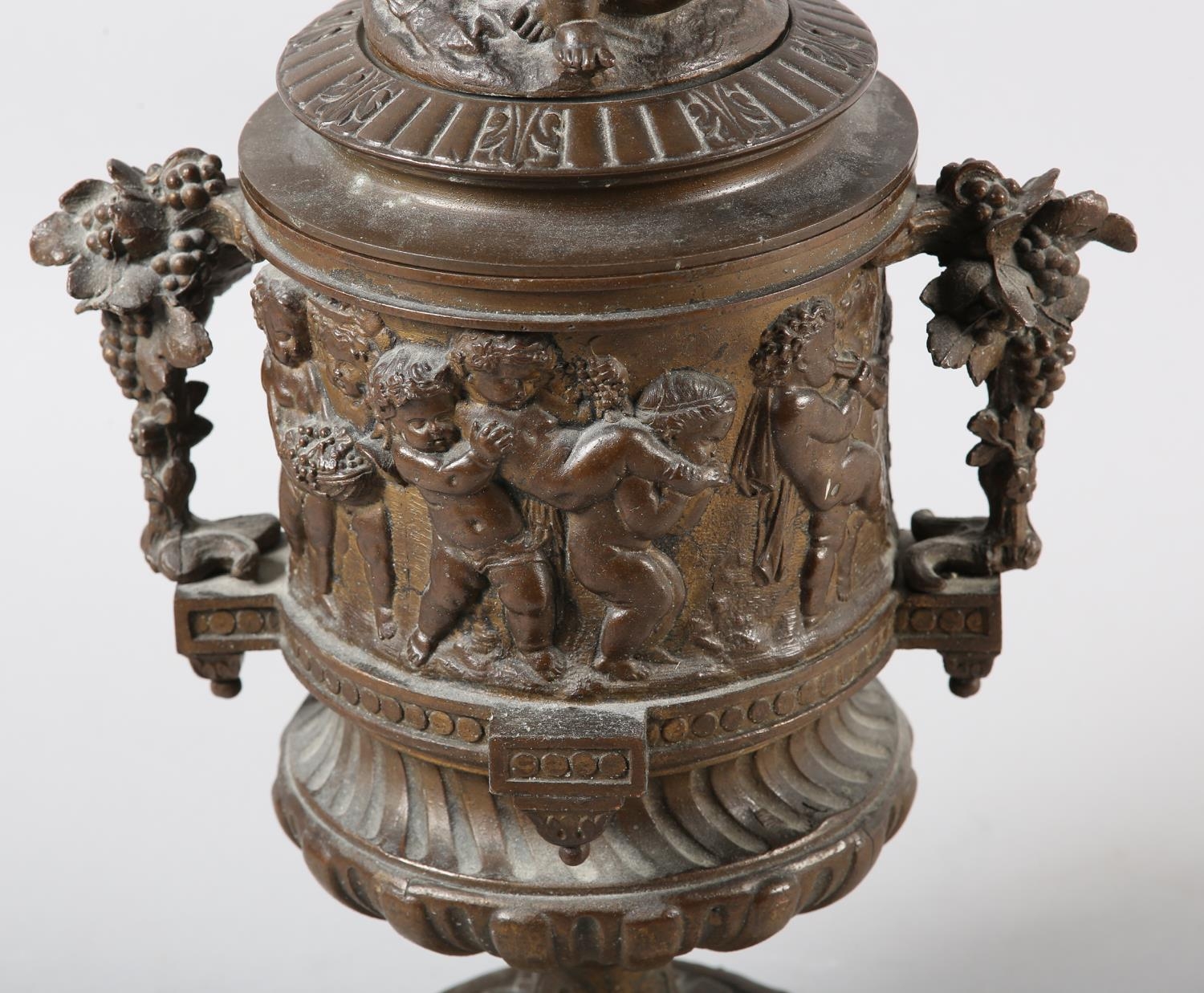 A 19TH CENTURY BRONZED METAL BACCHANALIAN TWO HANDLED CUP AND COVER, having a figural finial, the - Image 2 of 4