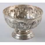 A VICTORIAN SILVER PEDESTAL FRUITBOWL, Walker & Hall, Sheffield 1895, embossed with 'C' scrolls